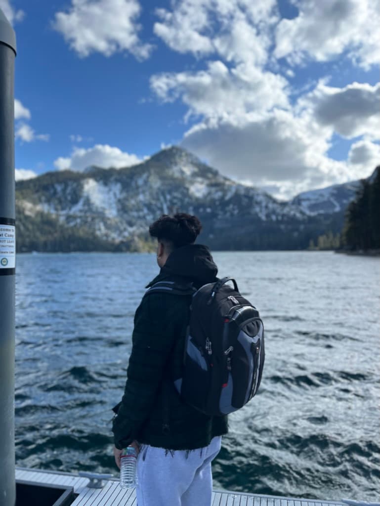 Tash at a mountain lake